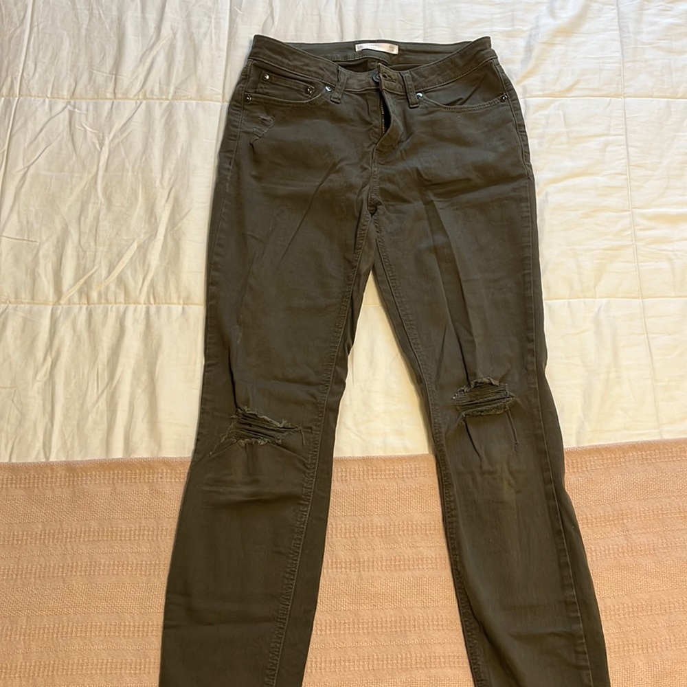 Olive green destroyed skinny jeans